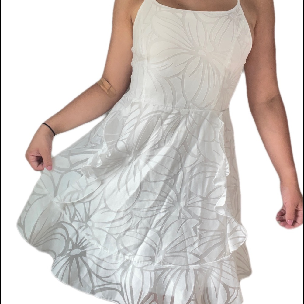 Delicate white dress.